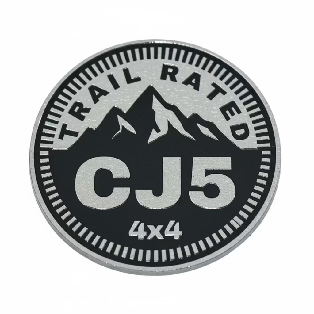 Trail Rated CJ5 4x4 badge on a textured metal surface