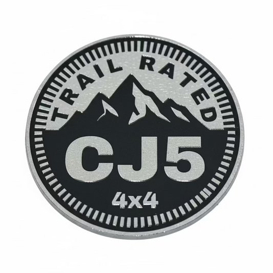 Trail Rated CJ5 4x4 badge on a textured metal surface
